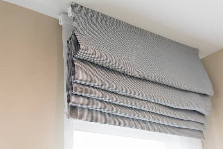 roman blinds rolled up