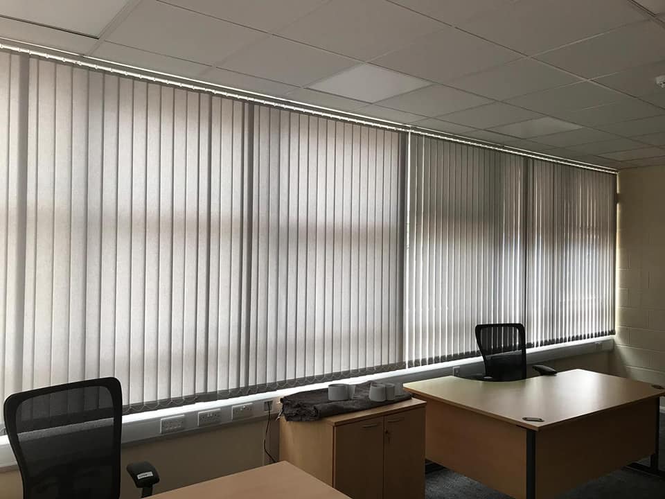 vertical blinds in an office